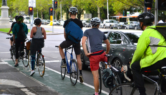 Bike commuters using bike lane