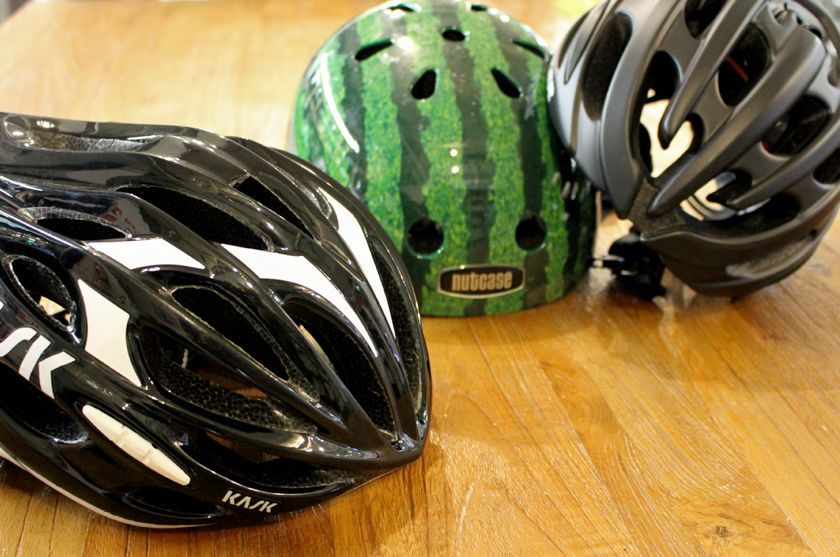 Pile of bicycle helmets